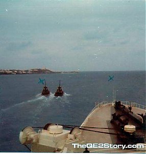 Tugs_manouver_us_between_bouys_marked_with_X_Bermuda.jpg